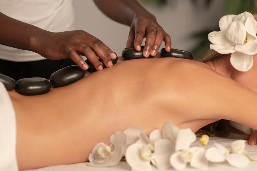 Espace de soin bien-être zen, ambiance apaisante aux bougies et pierres de massage